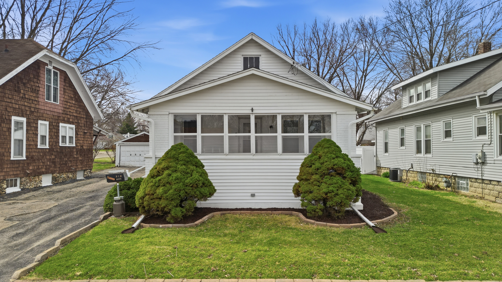 318 Spruce Street Dixon, IL 61021 - Photo 25 of 25 front view of a house with a yard