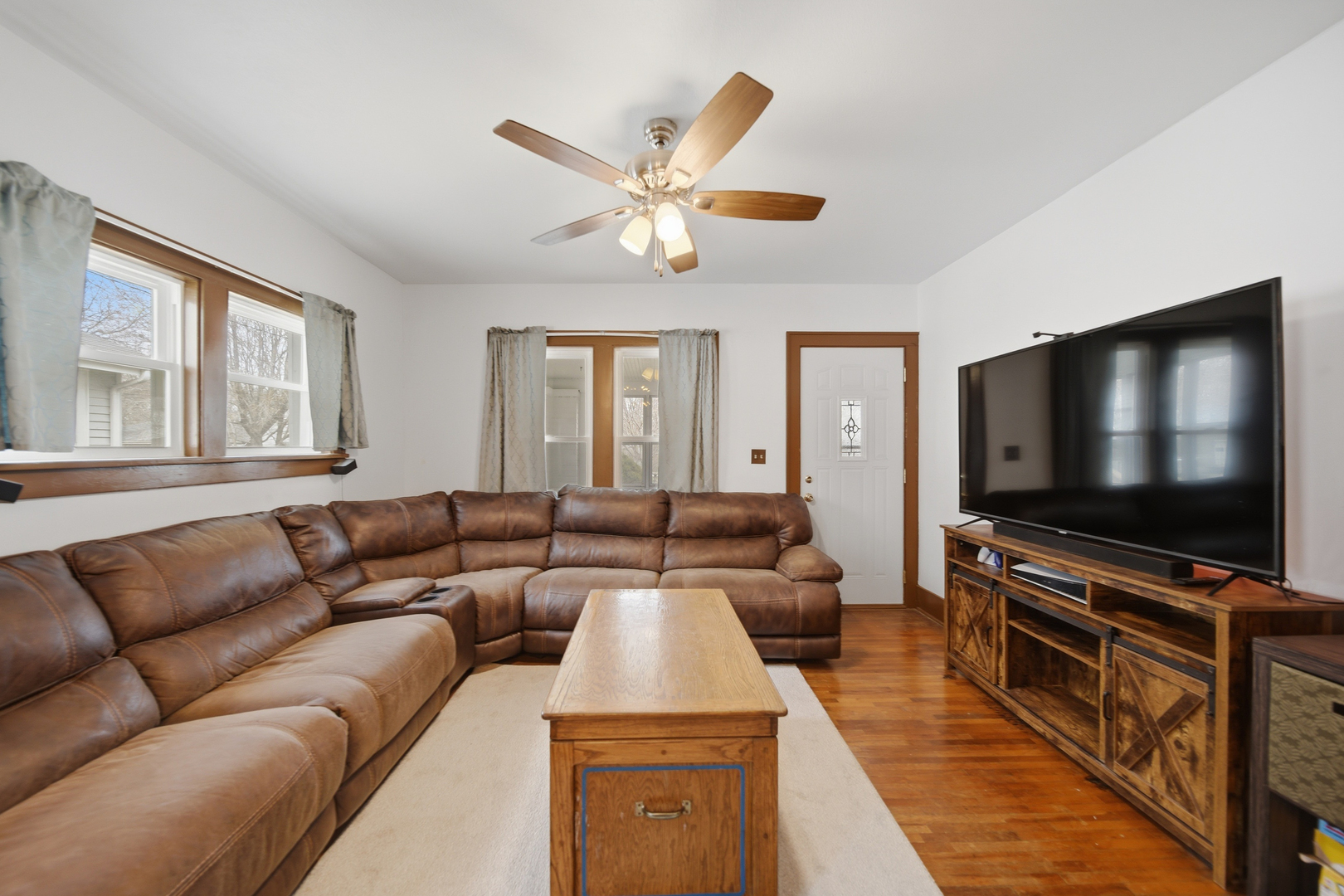 318 Spruce Street Dixon, IL 61021 - Photo 9 of 25 a living room with furniture and a flat screen tv