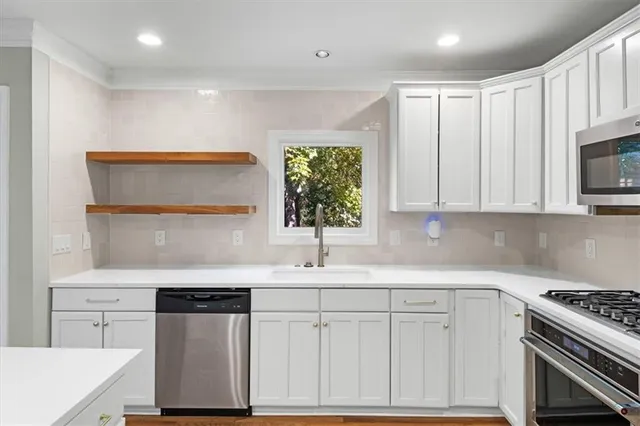 a view of a livingroom with furniture and a table