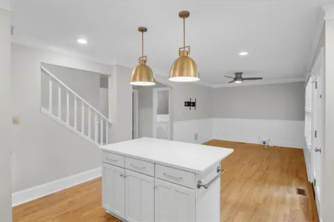 a view of a livingroom with furniture and a table