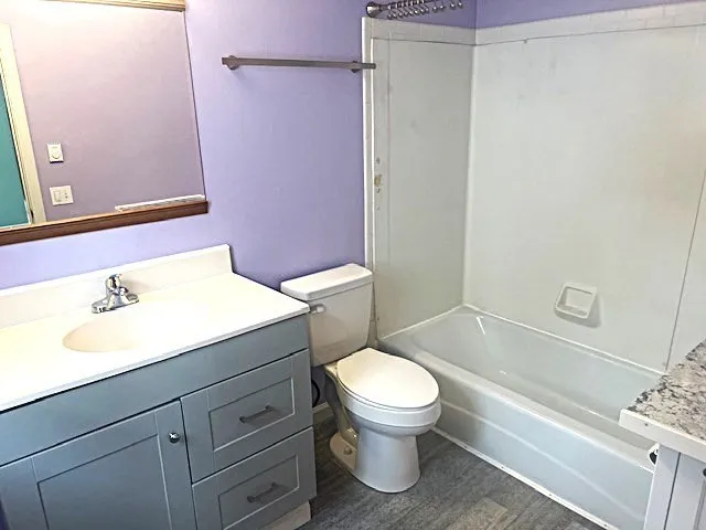 a view of a refrigerator and an window