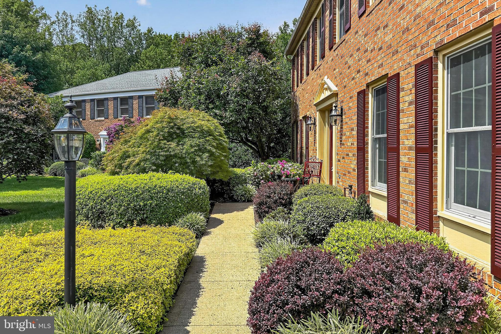 11601 Quail Ridge Court Reston, VA 20194 - Photo 81 of 87 Charming brick home with lush landscaping.