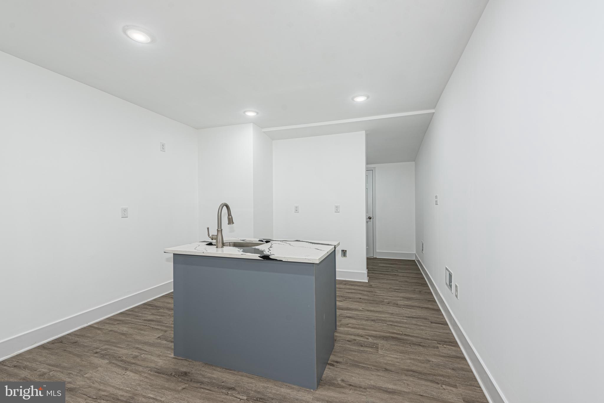 1007 North Mount Street Baltimore, MD 21217 - Photo 12 of 22 a view of a kitchen from the hallway