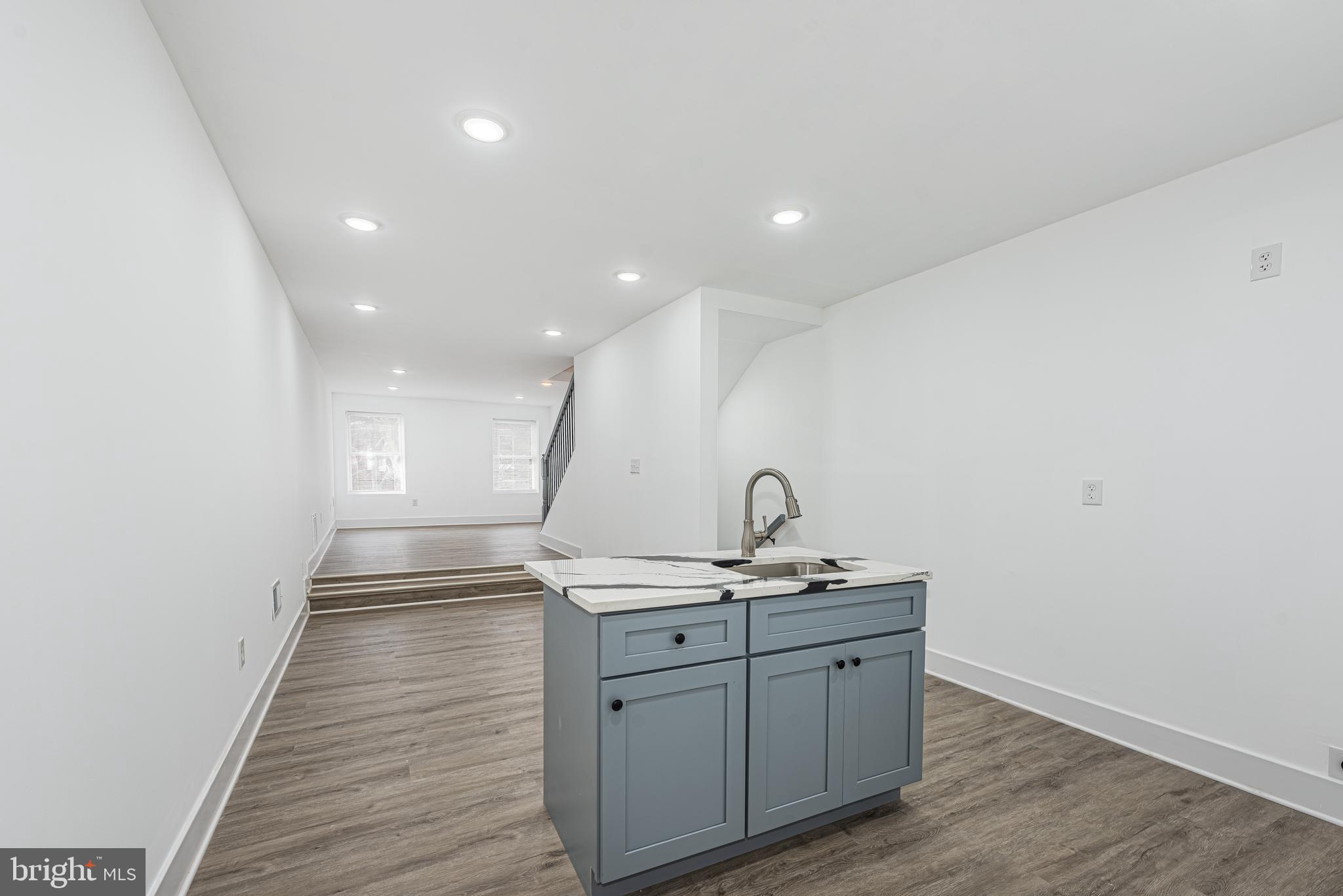 1007 North Mount Street Baltimore, MD 21217 - Photo 13 of 22 a bathroom with a sink and a mirror