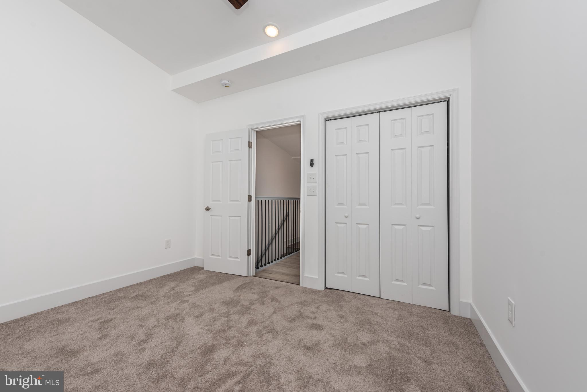 1007 North Mount Street Baltimore, MD 21217 - Photo 17 of 22 an empty room with closet area
