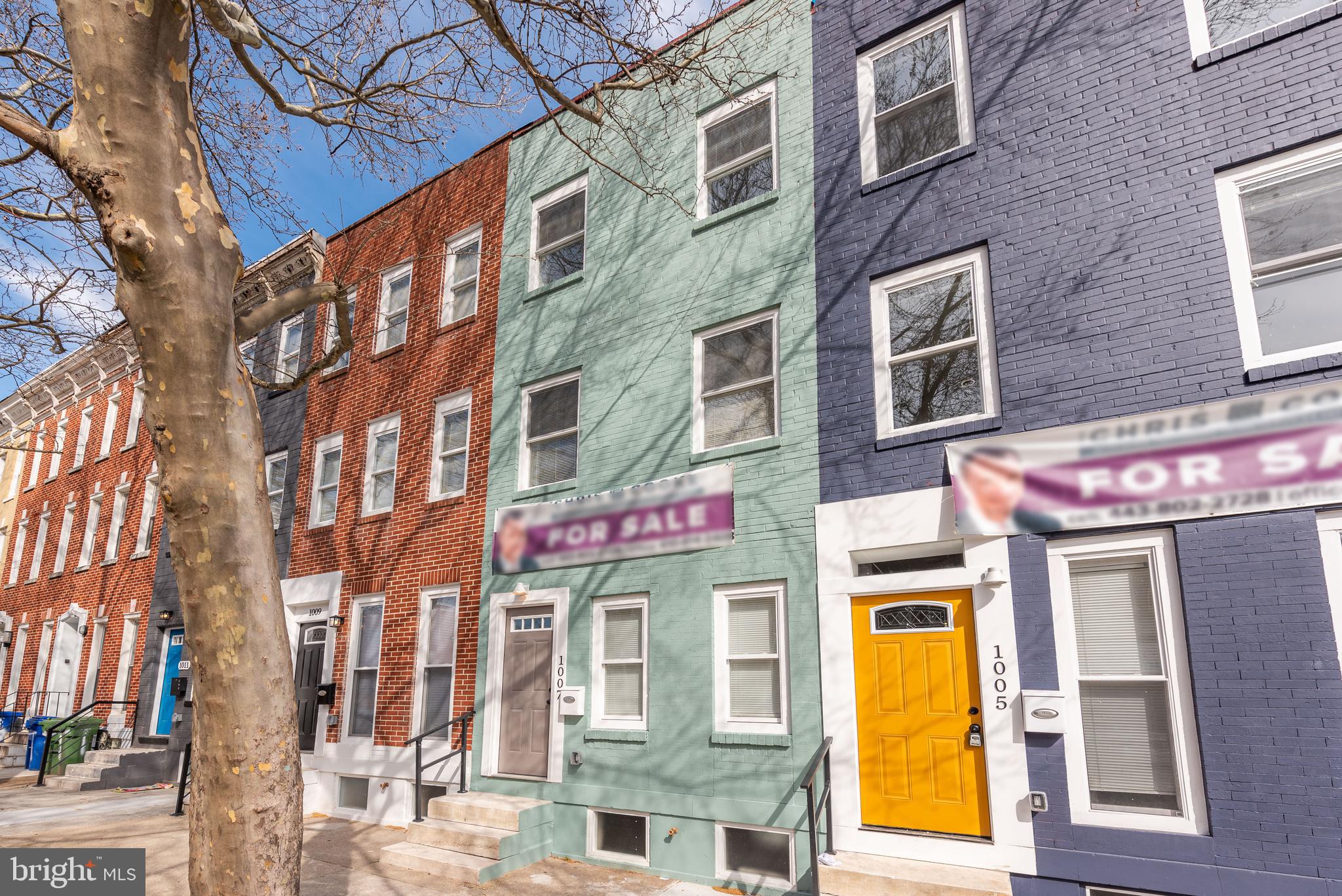 1007 North Mount Street Baltimore, MD 21217 - Photo 22 of 22 a view of a brick building with many windows