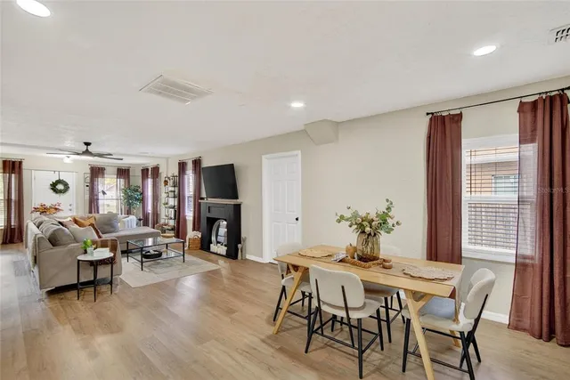 a bed room with furniture and a book shelf