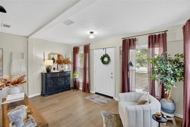 a bedroom with furniture and a bed