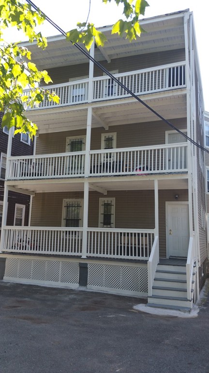 35 Kenberma Road Boston, MA 02124 - Photo 2 of 17 a view of a house with a deck