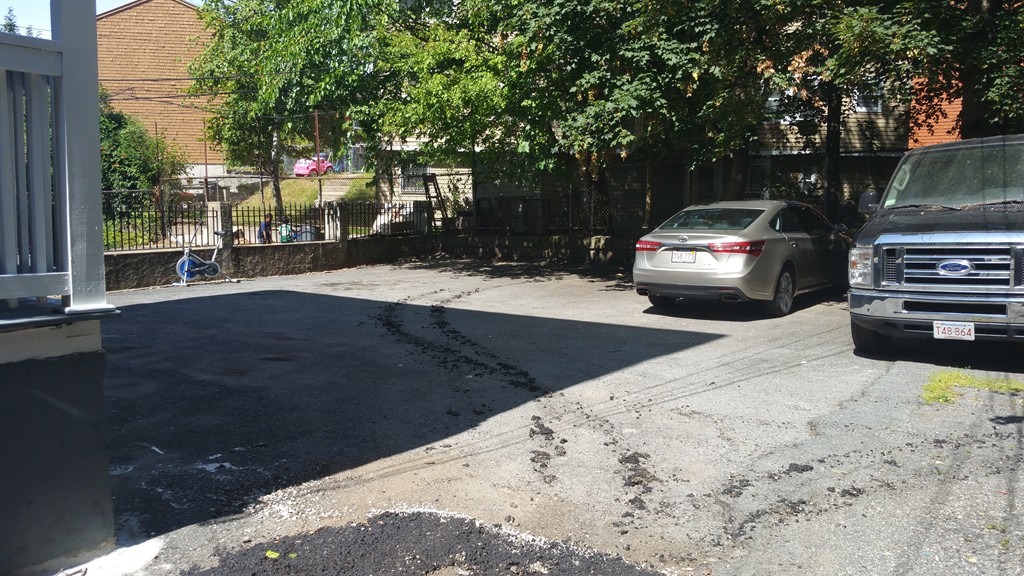 35 Kenberma Road Boston, MA 02124 - Photo 3 of 17 a view of a backyard of a house