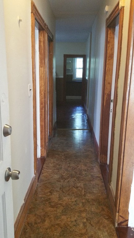 35 Kenberma Road Boston, MA 02124 - Photo 4 of 17 a view of gallery with wooden floor