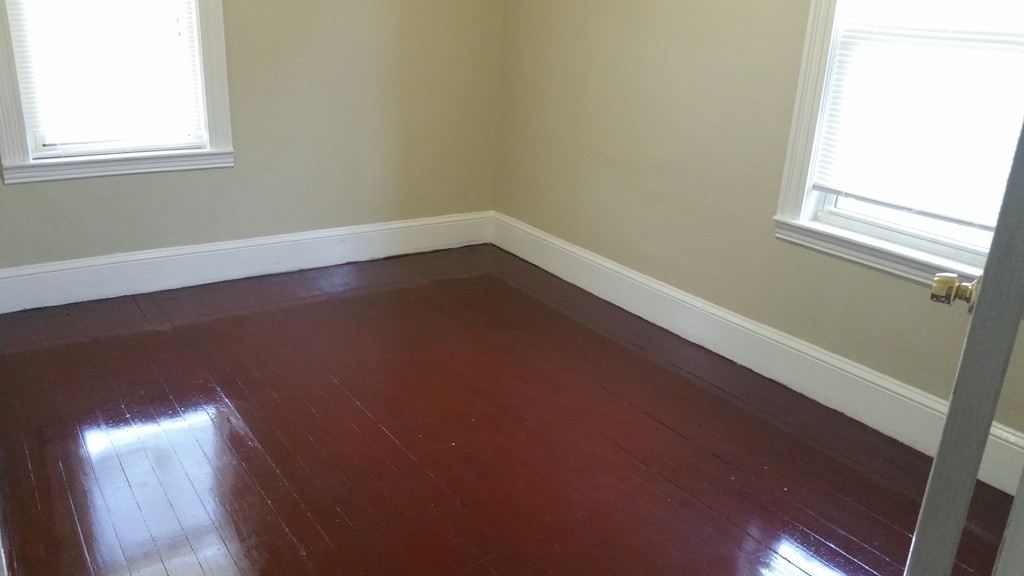 35 Kenberma Road Boston, MA 02124 - Photo 8 of 17 an empty room with a window