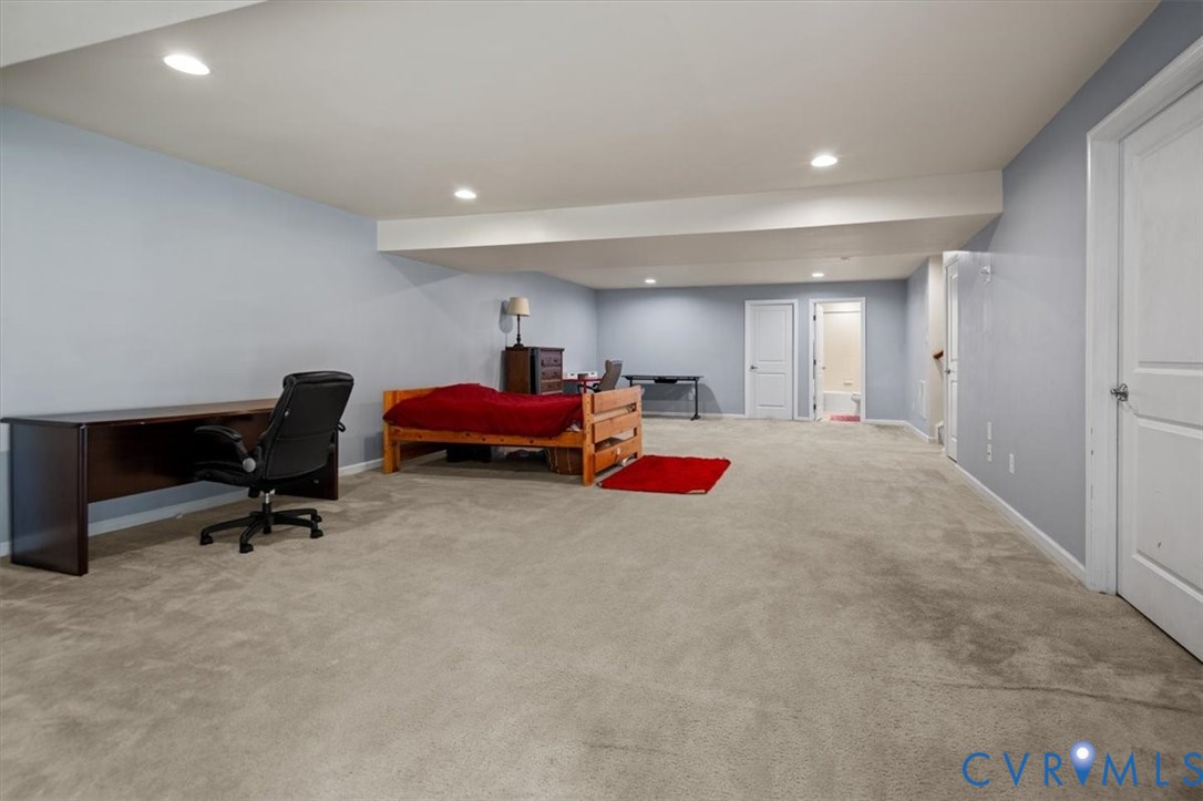 9013 Bailey Hill Road Midlothian, VA 23112 - Photo 50 of 56 Spacious carpeted room featuring recessed lighting