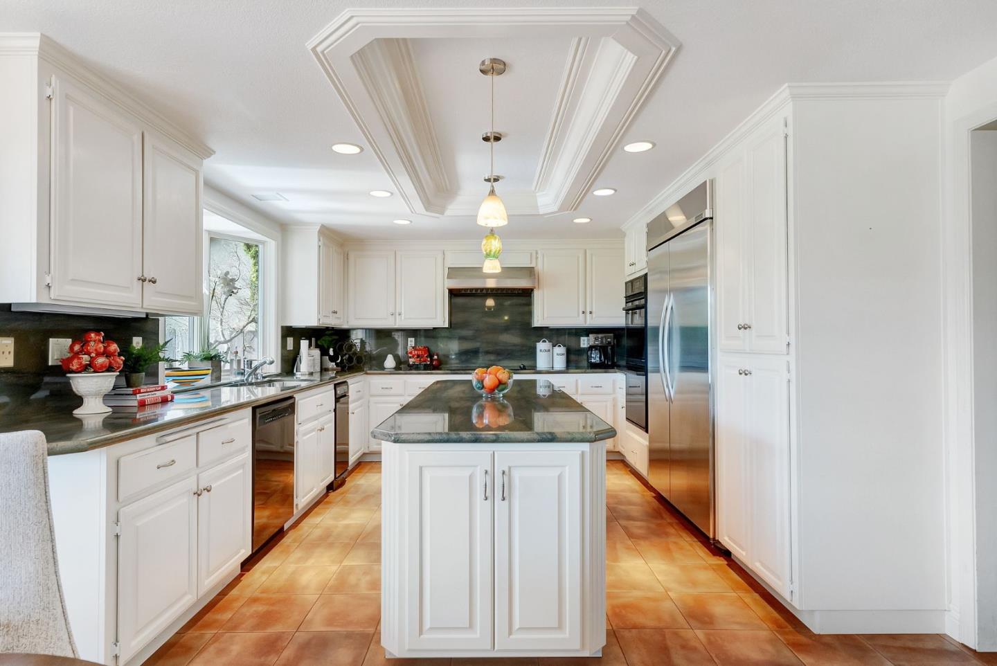 1544 Edmond Drive San Carlos, CA 94070 - Photo 11 of 44 a kitchen with stainless steel appliances granite countertop a sink a stove and cabinets
