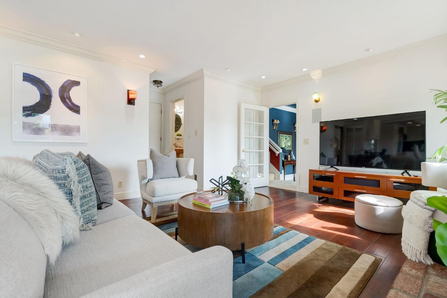1544 Edmond Drive San Carlos, CA 94070 - Photo 16 of 44 a living room with furniture and a flat screen tv