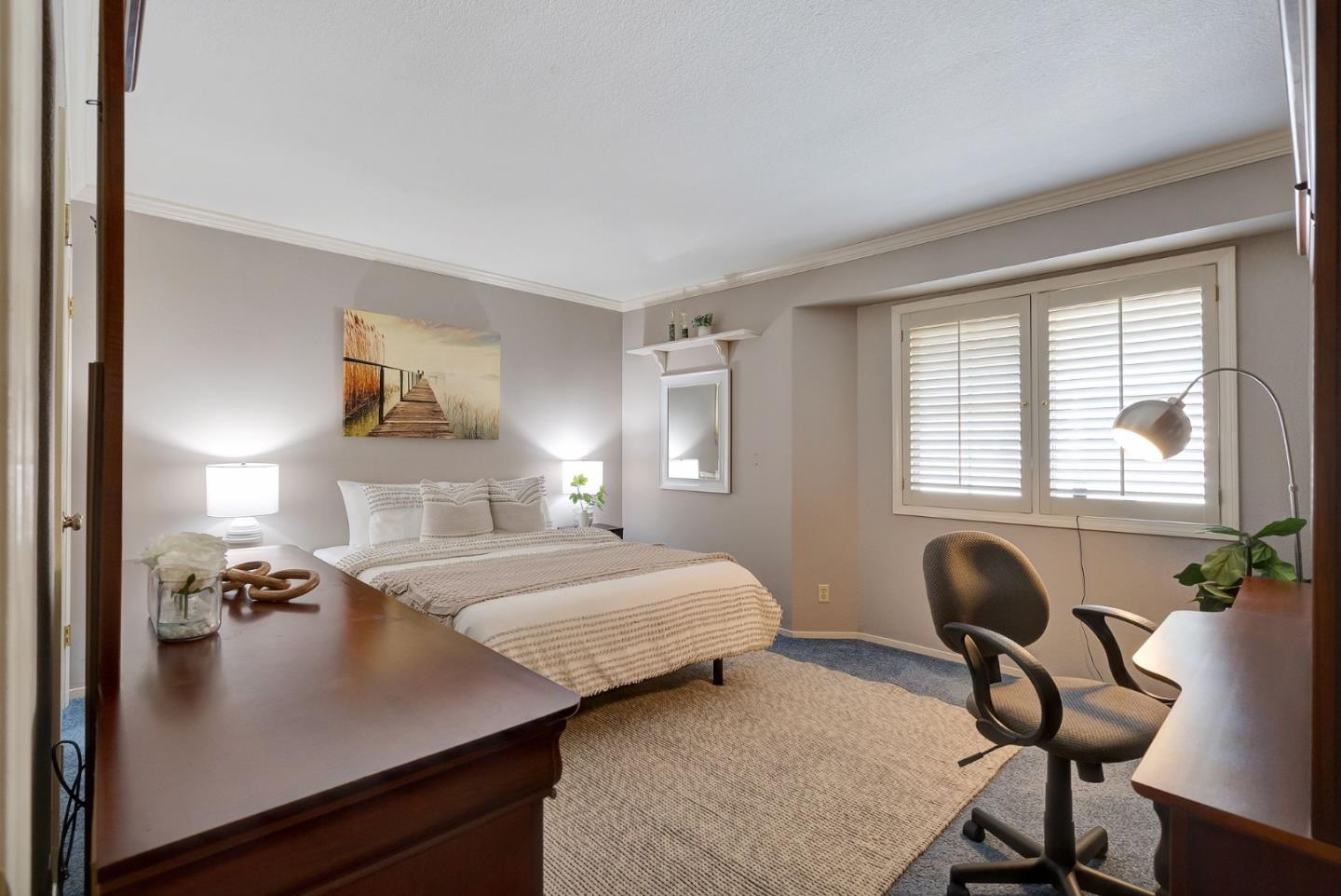 1544 Edmond Drive San Carlos, CA 94070 - Photo 24 of 44 a bedroom with a bed and a chair