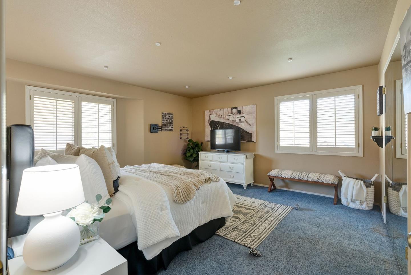 1544 Edmond Drive San Carlos, CA 94070 - Photo 26 of 44 a spacious bedroom with a bed and window