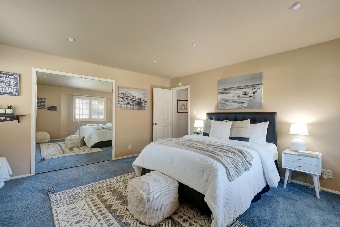 1544 Edmond Drive San Carlos, CA 94070 - Photo 27 of 44 a bedroom with a bed and wooden floor