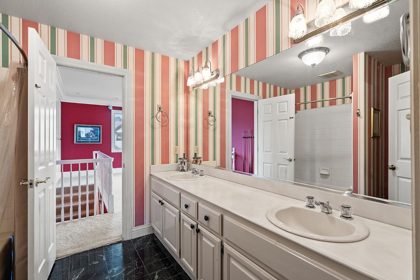 1544 Edmond Drive San Carlos, CA 94070 - Photo 28 of 44 a bathroom with a sink double vanity and a mirror