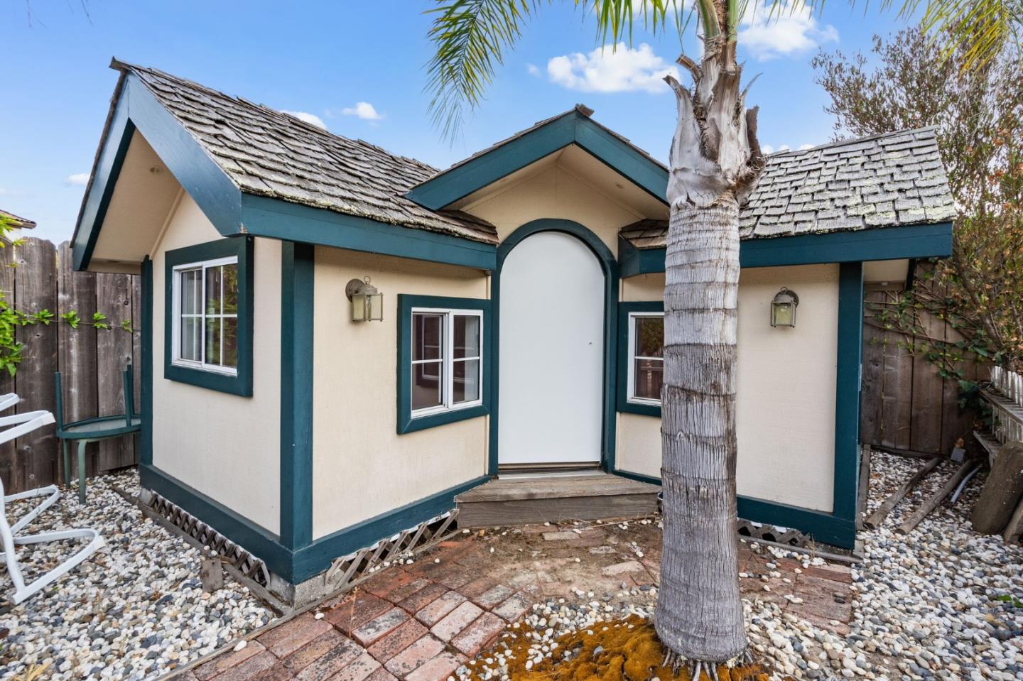 1544 Edmond Drive San Carlos, CA 94070 - Photo 32 of 44 a front view of a house with garden