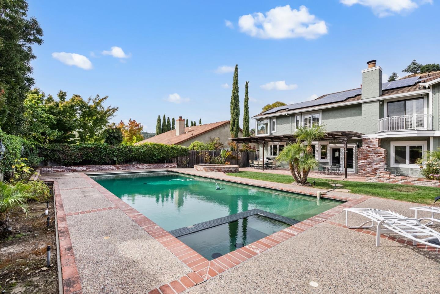 1544 Edmond Drive San Carlos, CA 94070 - Photo 38 of 44 a view of a house with swimming pool having outdoor seating