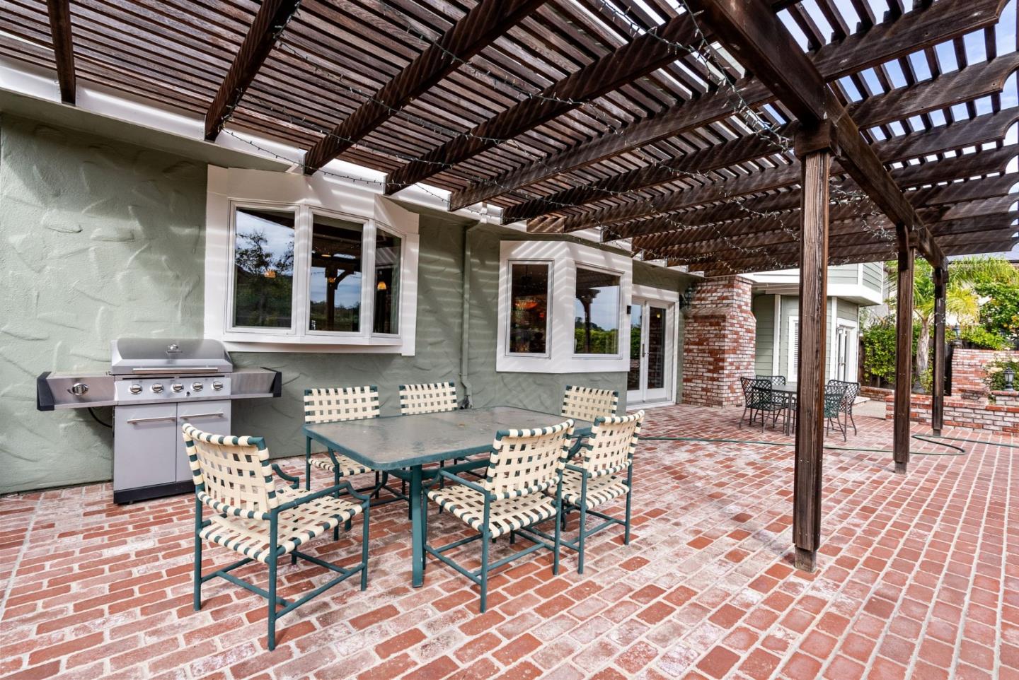 1544 Edmond Drive San Carlos, CA 94070 - Photo 39 of 44 a outdoor space with lots of chairs and chandelier