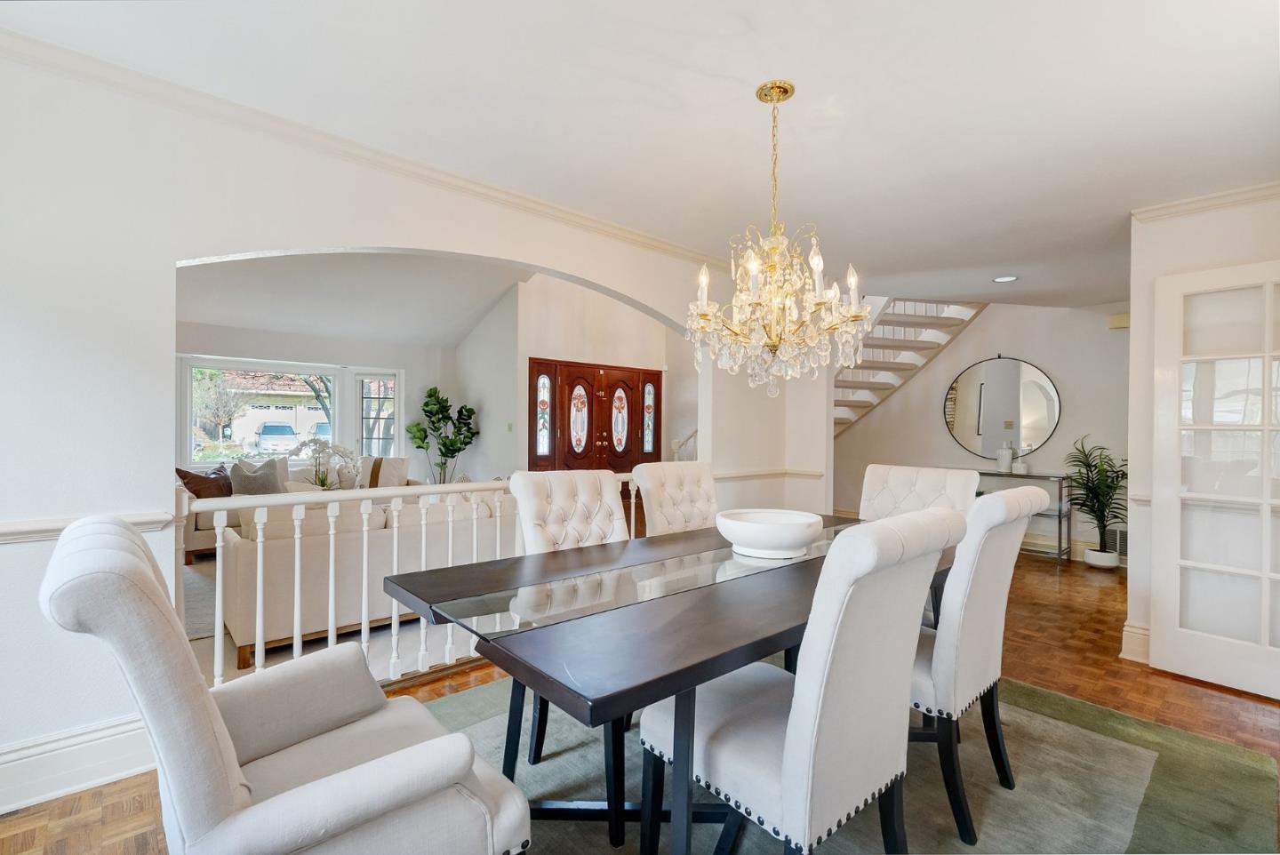 1544 Edmond Drive San Carlos, CA 94070 - Photo 9 of 44 a view of a dining room with furniture a chandelier and wooden floor