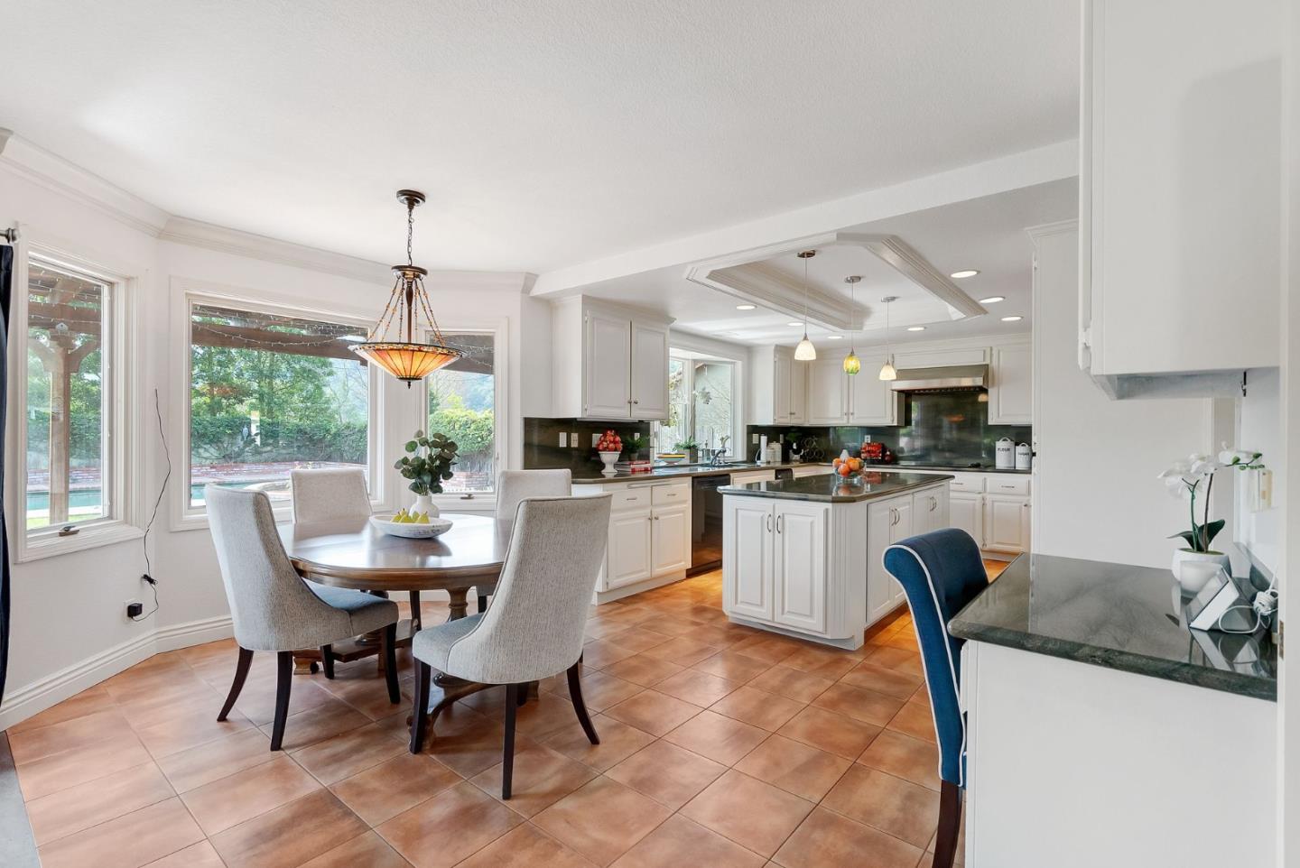 1544 Edmond Drive San Carlos, CA 94070 - Photo 10 of 44 a view of a dining room with furniture and a window