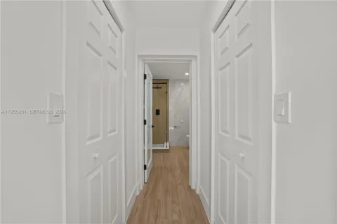 a view of a swimming pool with a lounge chair