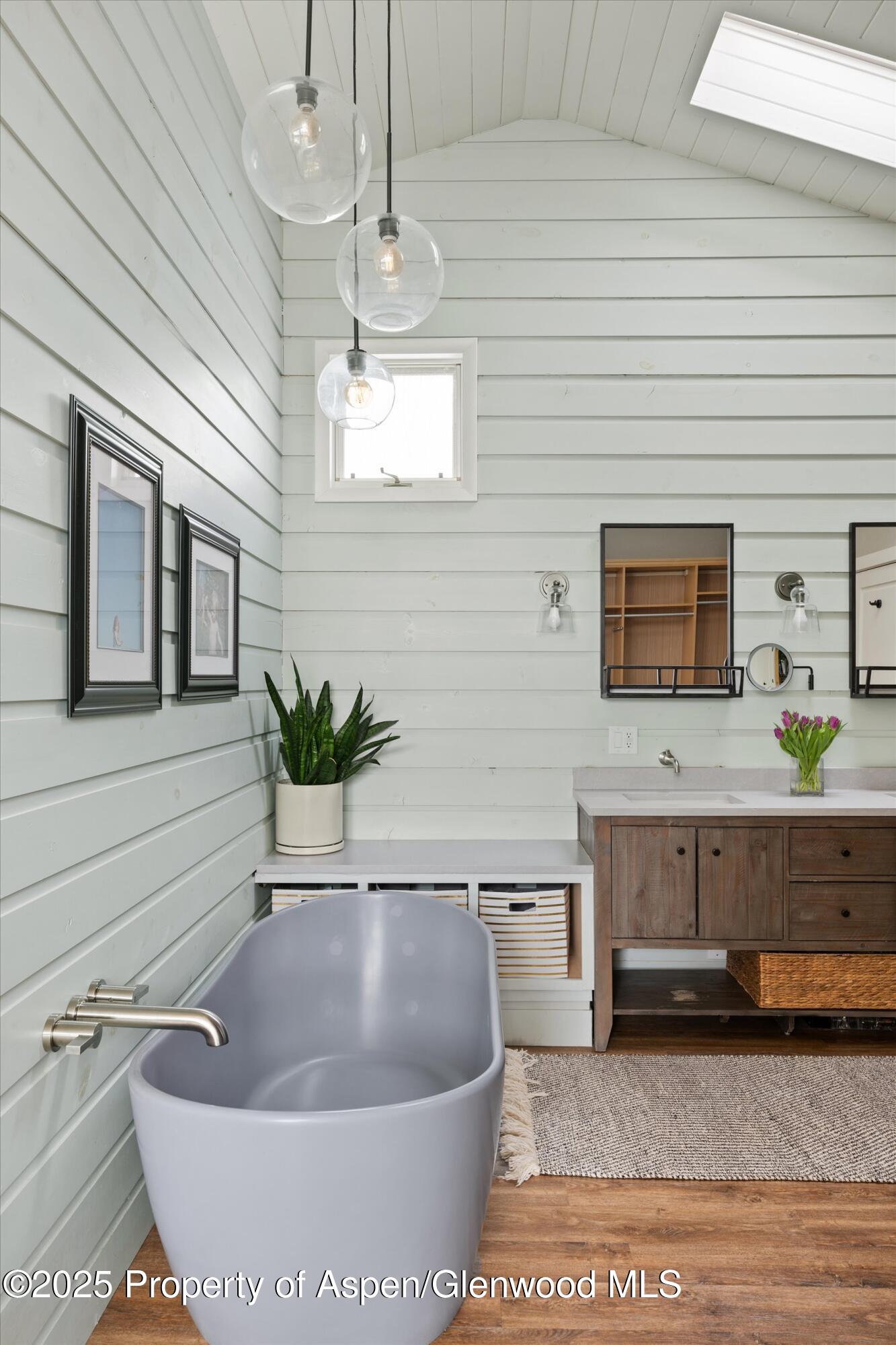 516 Sinclair Road Snowmass Village, CO 81615 - Photo 25 of 37 a living room with a couch and a flat screen tv