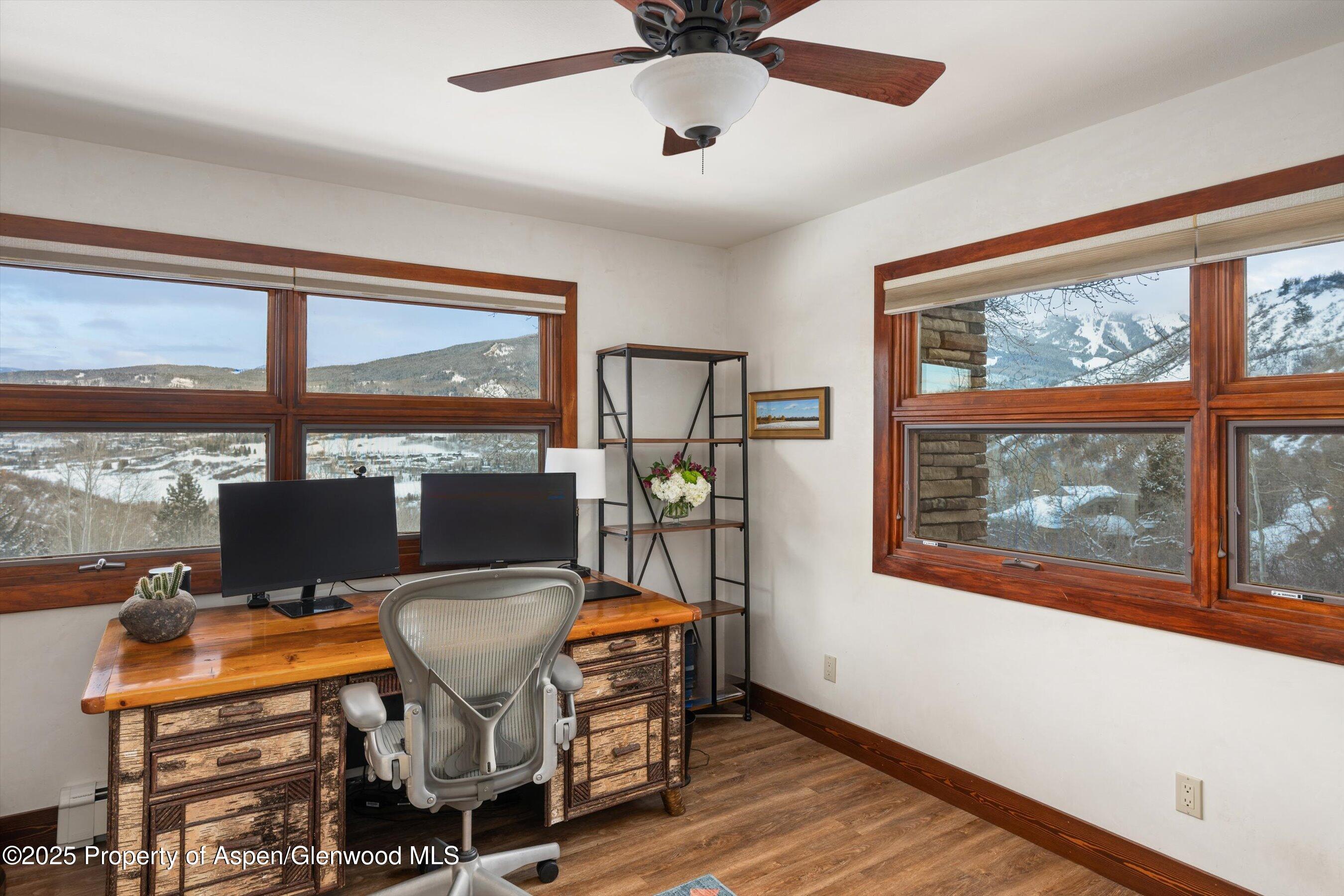 516 Sinclair Road Snowmass Village, CO 81615 - Photo 36 of 37 a view of a workspace with furniture and a window