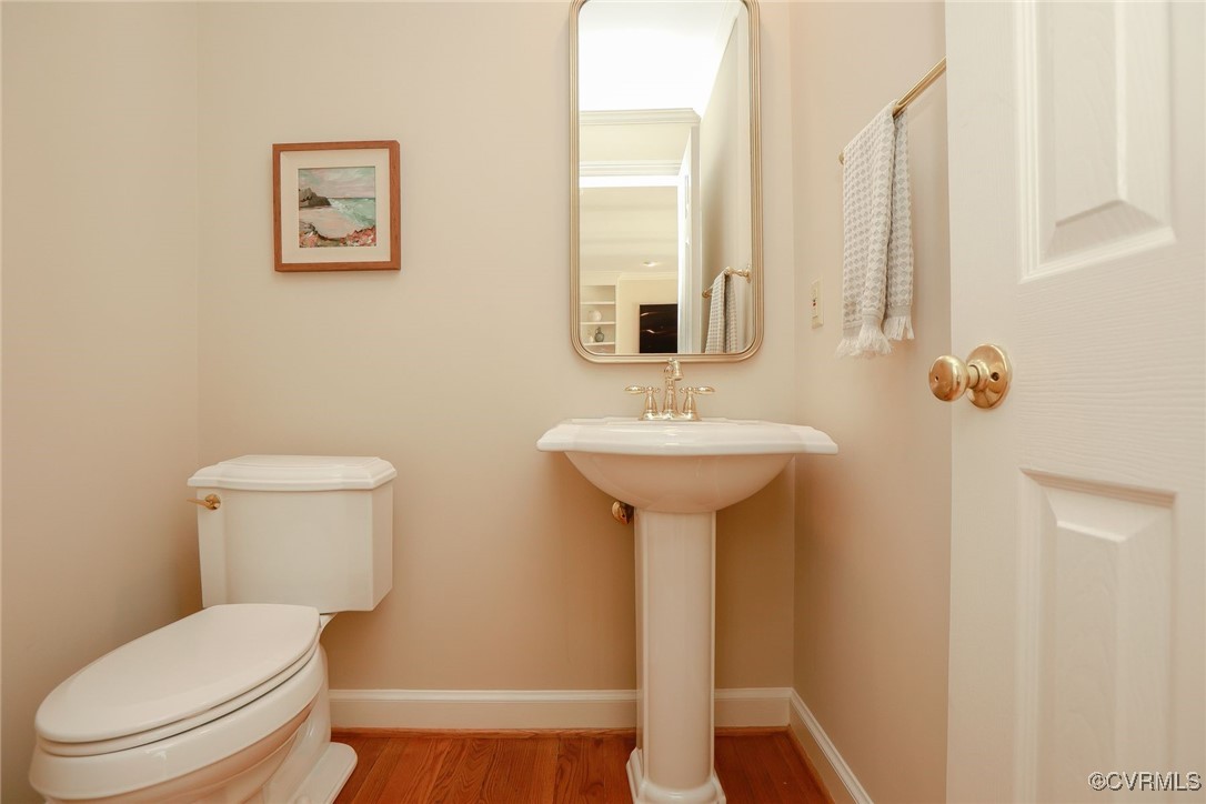 107 Muirfield Williamsburg, VA 23188 - Photo 12 of 36 a white toilet sitting next to a bathroom sink
