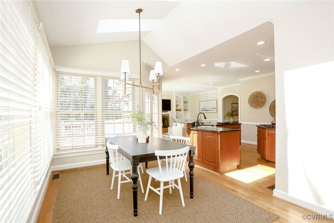 107 Muirfield Williamsburg, VA 23188 - Photo 17 of 36 a dining room with furniture and wooden floor