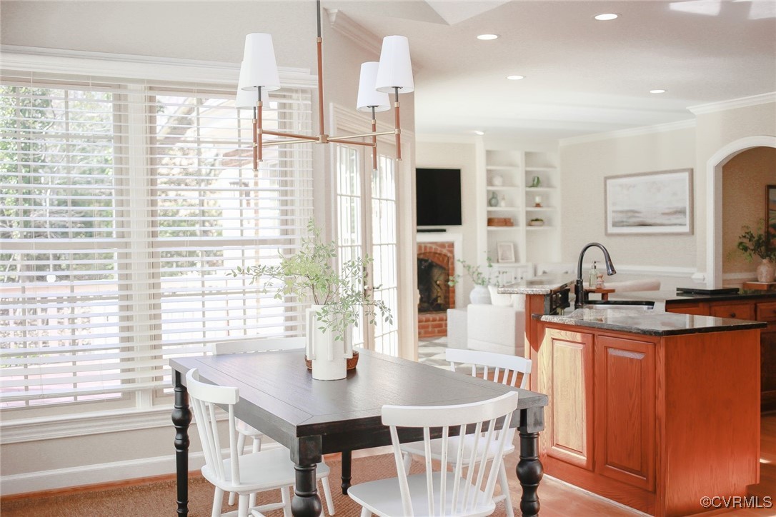 107 Muirfield Williamsburg, VA 23188 - Photo 18 of 36 a kitchen with stainless steel appliances granite countertop a sink and a stove