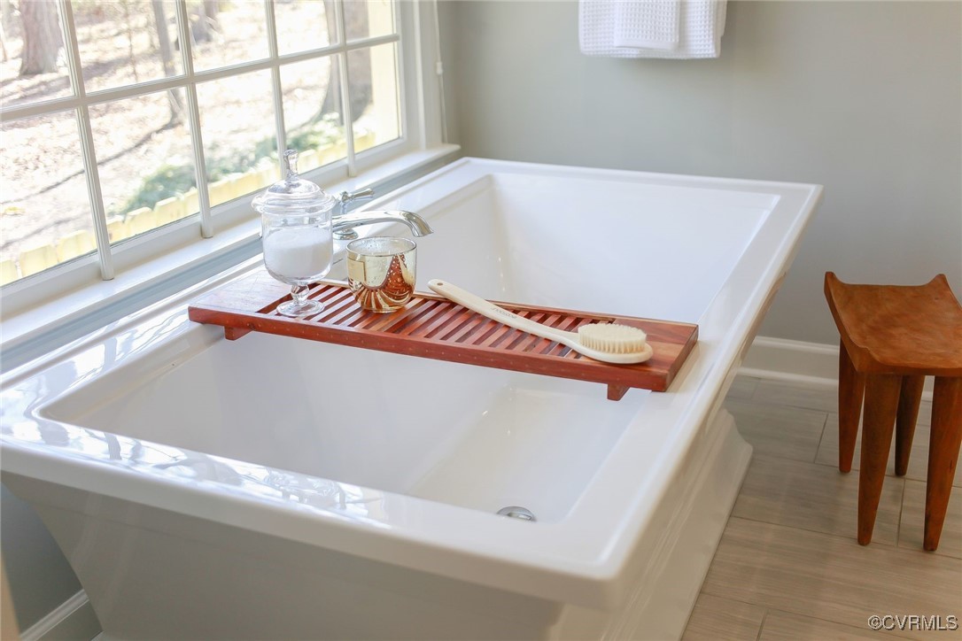 107 Muirfield Williamsburg, VA 23188 - Photo 23 of 36 a view of a living room with furniture and a window