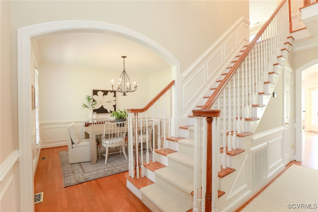 107 Muirfield Williamsburg, VA 23188 - Photo 25 of 36 a view of entryway and hall with wooden floor