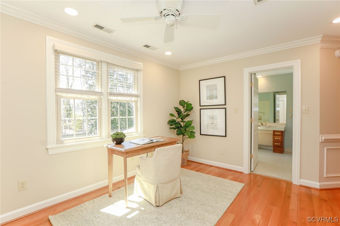 107 Muirfield Williamsburg, VA 23188 - Photo 26 of 36 a workspace with wooden floor and windows
