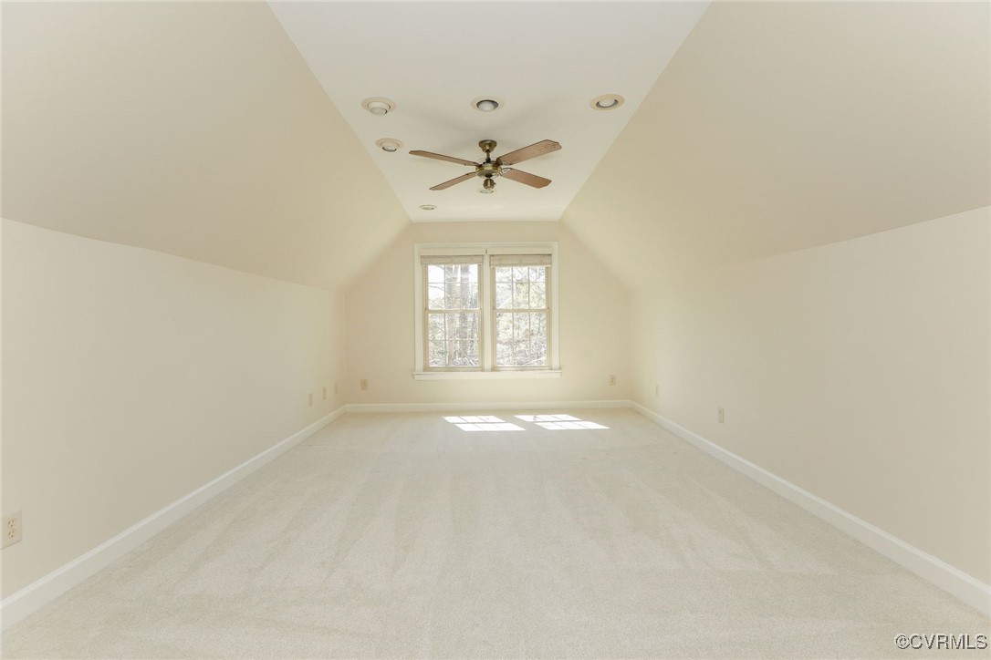 107 Muirfield Williamsburg, VA 23188 - Photo 32 of 36 an empty room with windows and ceiling fan