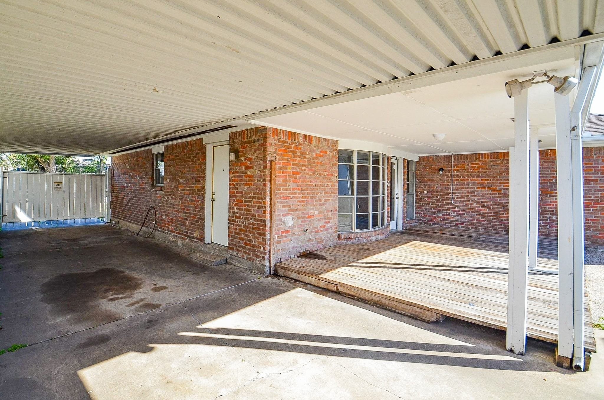 9215 Sharpcrest Street Houston, TX 77036 - Photo 22 of 31 a view of a porch