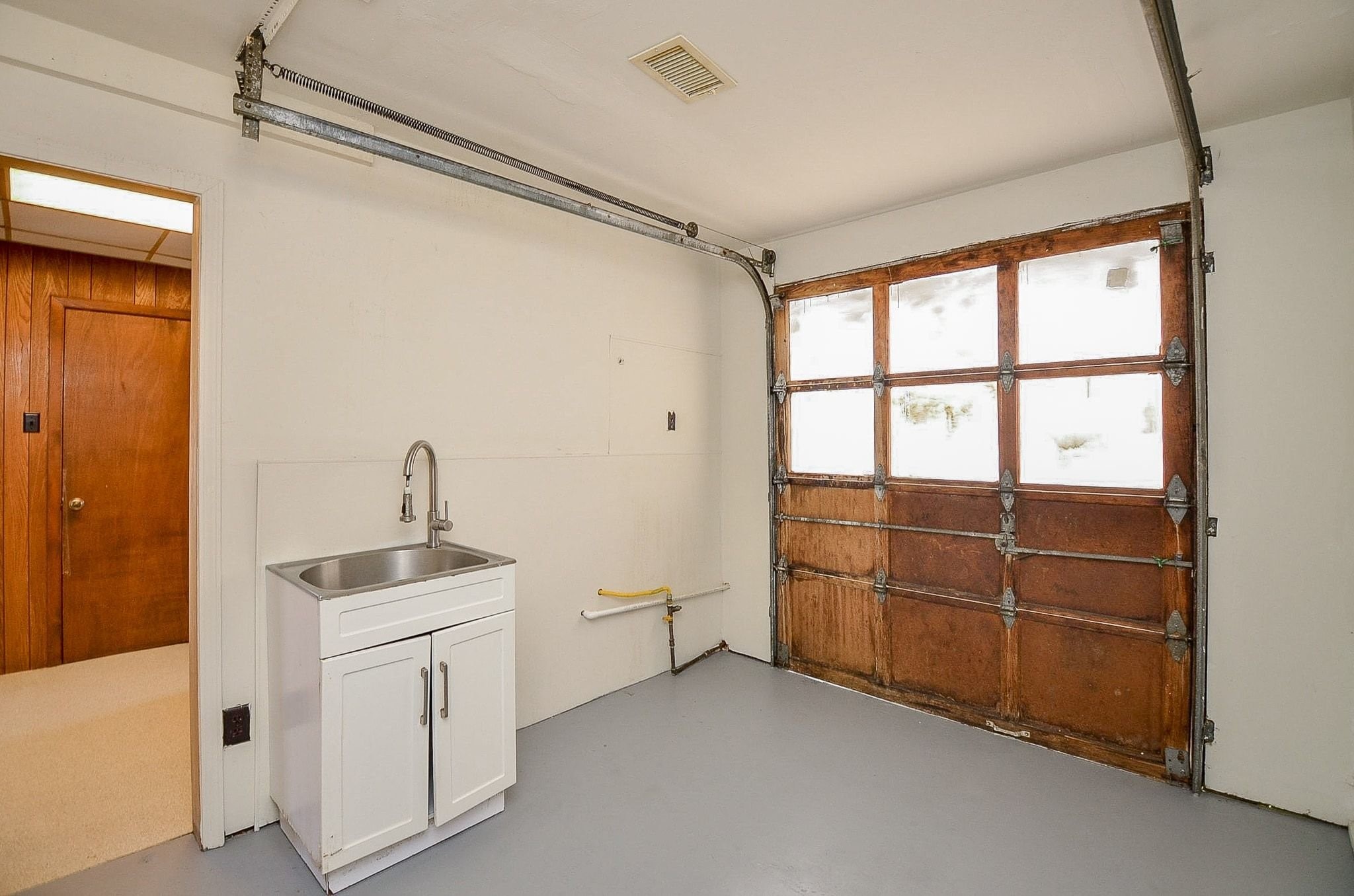 9215 Sharpcrest Street Houston, TX 77036 - Photo 26 of 31 a room with storage and utility