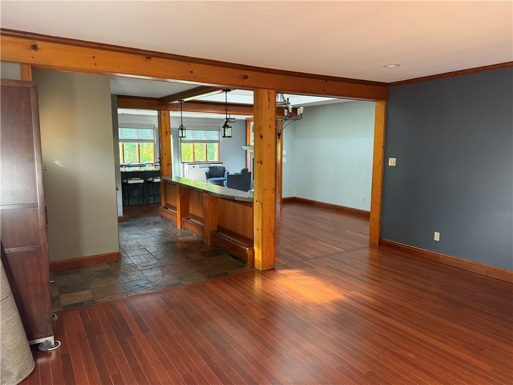 3137 Harts Run Road Allison Park, PA 15101 - Photo 3 of 11 an empty room with wooden floor and furniture