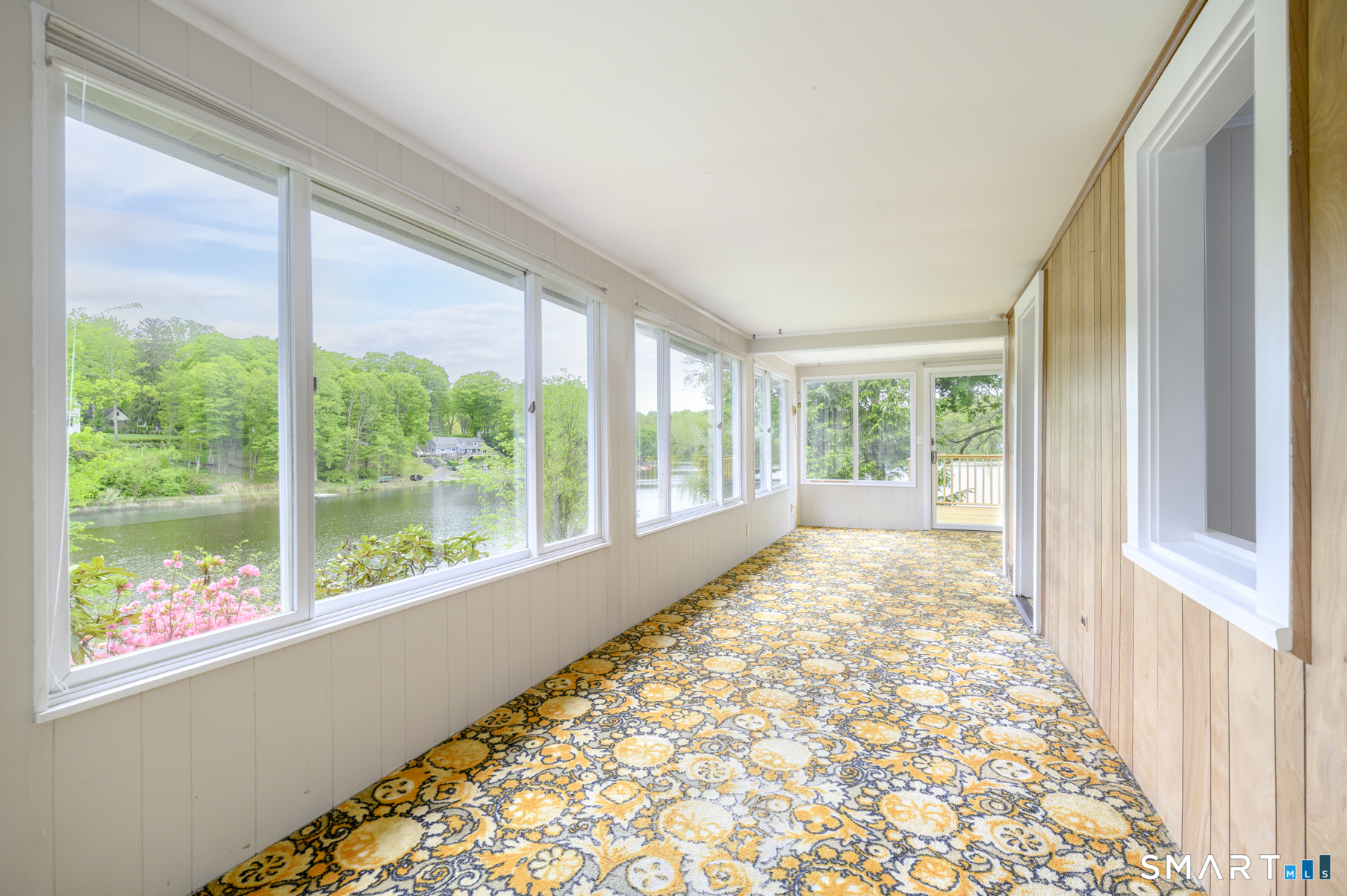 10 Clearview Drive Ridgefield, CT 06877 - Photo 6 of 26 Enclosed Porch -wall of windows -water views
