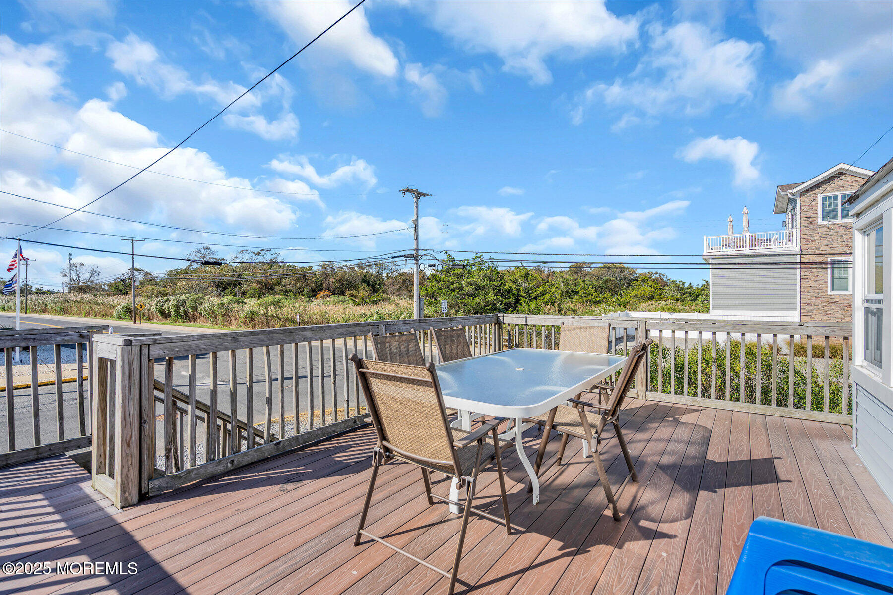 549 Brielle Road, Unit 1/2 Manasquan, NJ 08736 - Photo 3 of 10 a view of a balcony with furniture