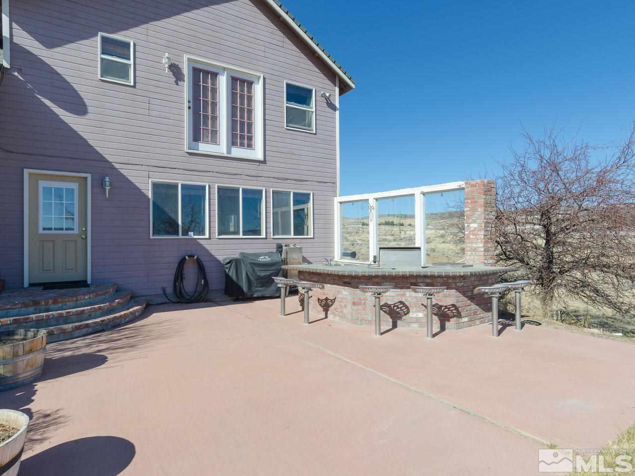 10315 Placerville Road Reno, NV 89508 - Photo 20 of 25 a view of a house with yard and sitting area