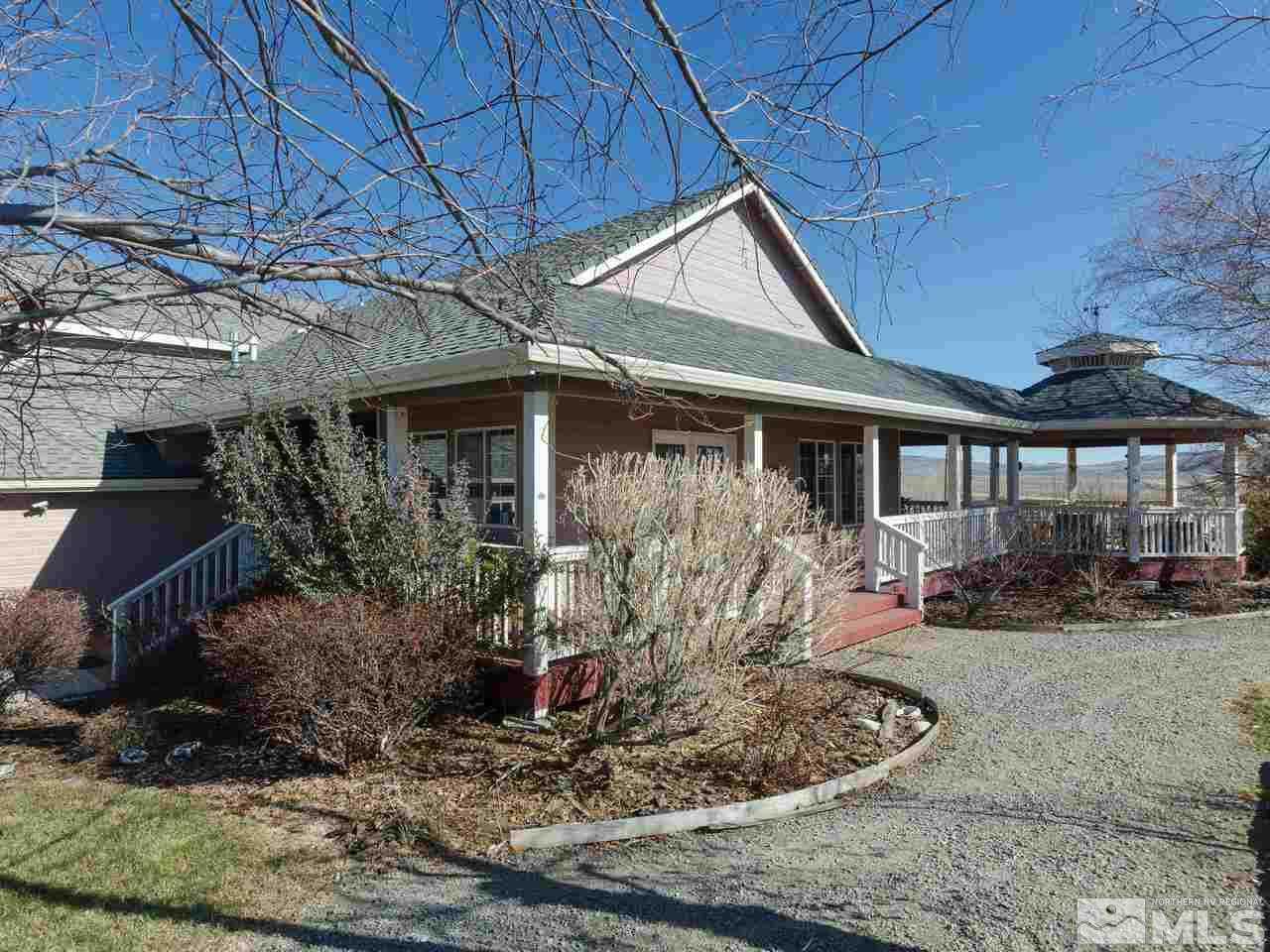 10315 Placerville Road Reno, NV 89508 - Photo 21 of 25 a front view of a house with garden