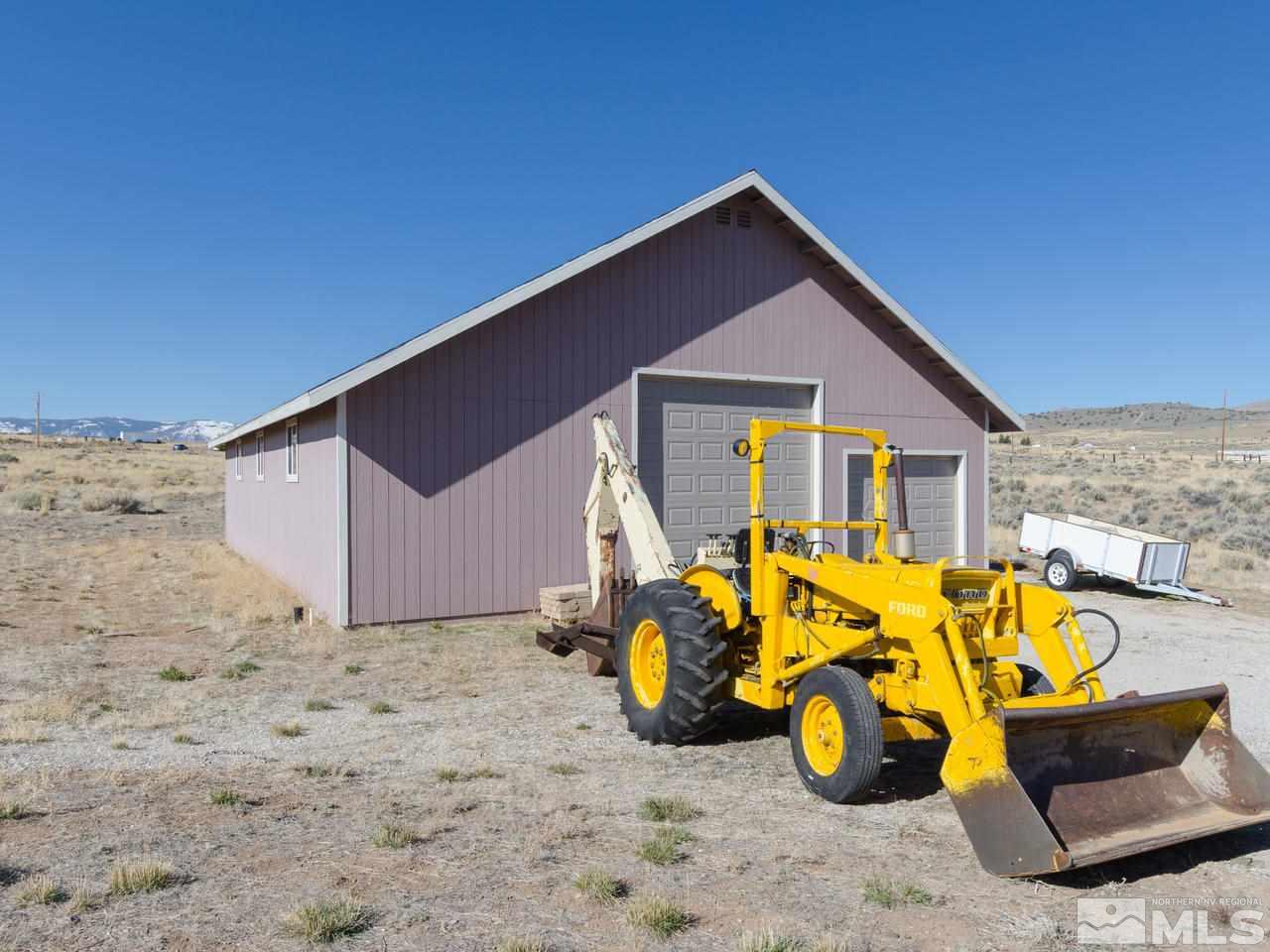 10315 Placerville Road Reno, NV 89508 - Photo 22 of 25 a view of a house with a backyard
