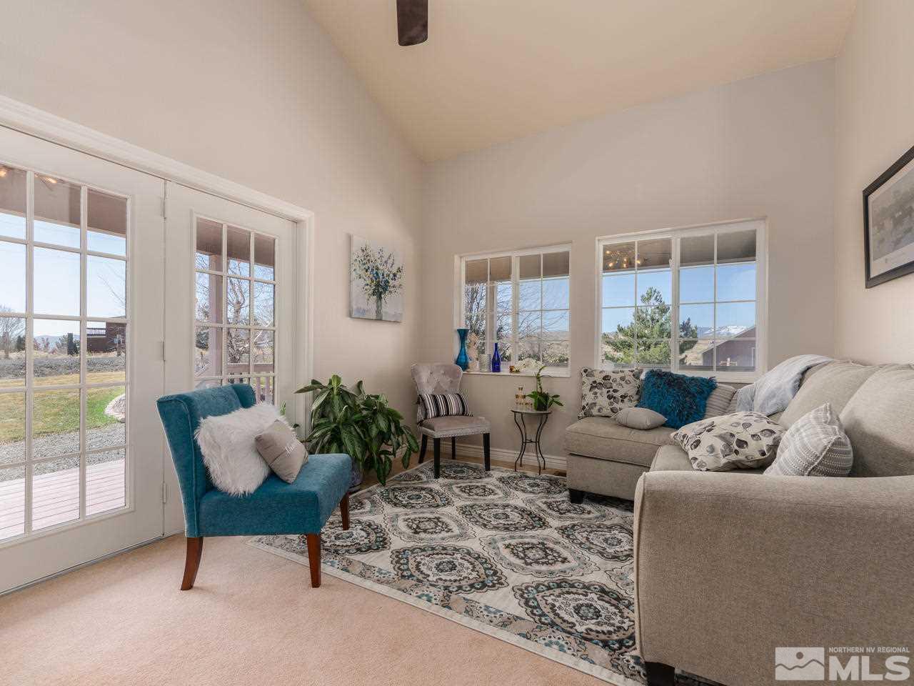 10315 Placerville Road Reno, NV 89508 - Photo 5 of 25 a living room with furniture and a large window