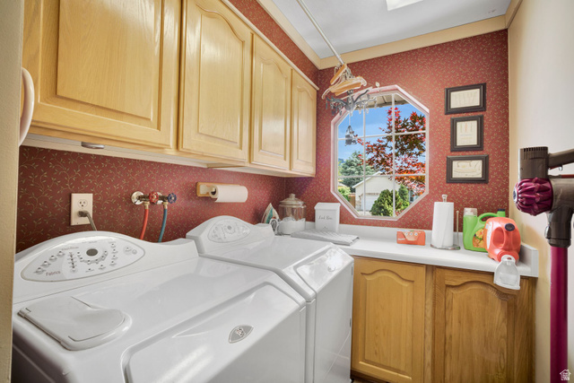 2139 Village Point Way Sandy, UT 84093 - Photo 18 of 35 Dedicated laundry room featuring a geometric window looking out from front of the home. Tons of cabinet storage. Convenient hallway location.