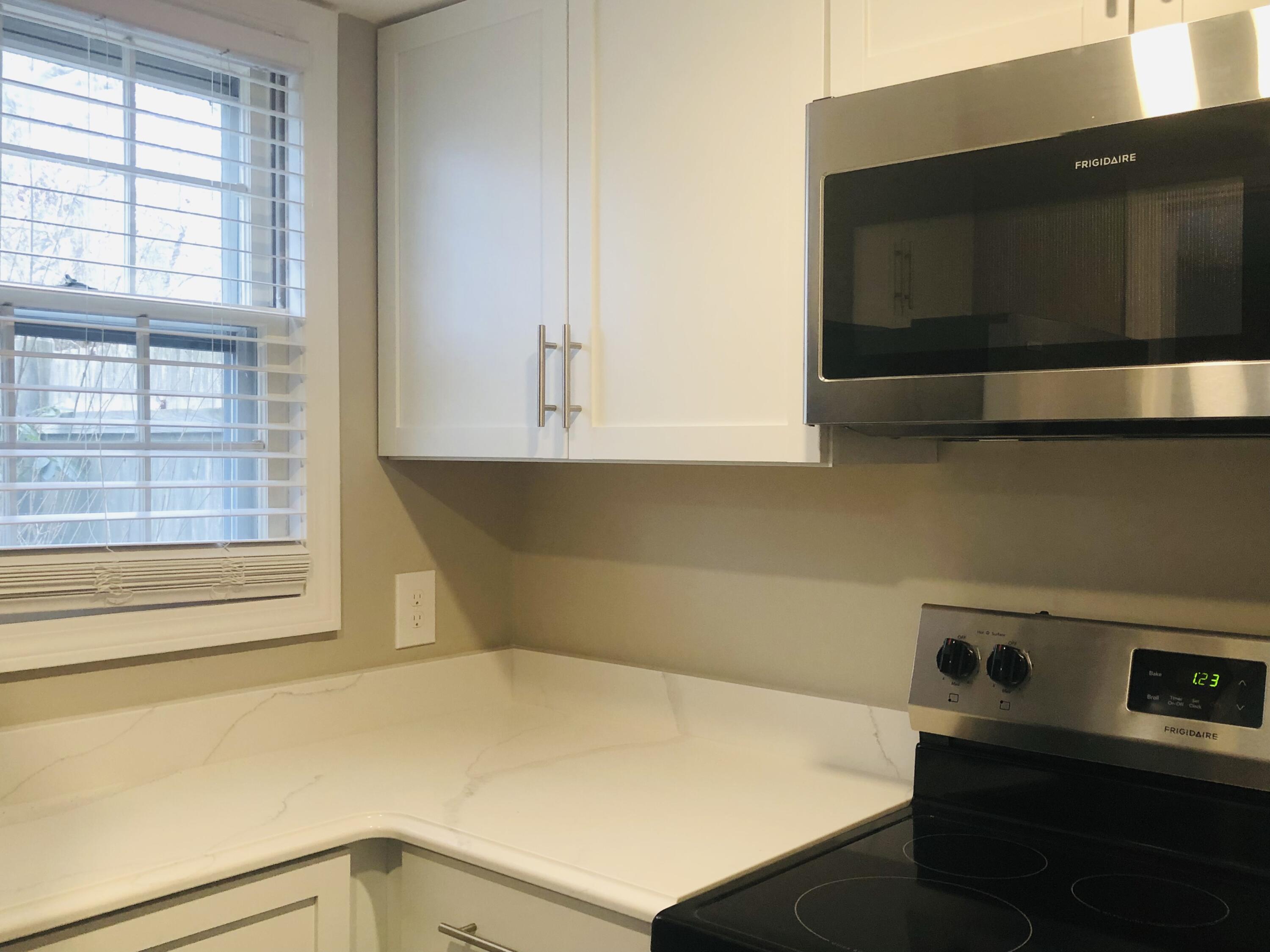 135 West Main Street, Unit 26 Hyannis, MA 02601 - Photo 13 of 29 a utility room with dryer and washer