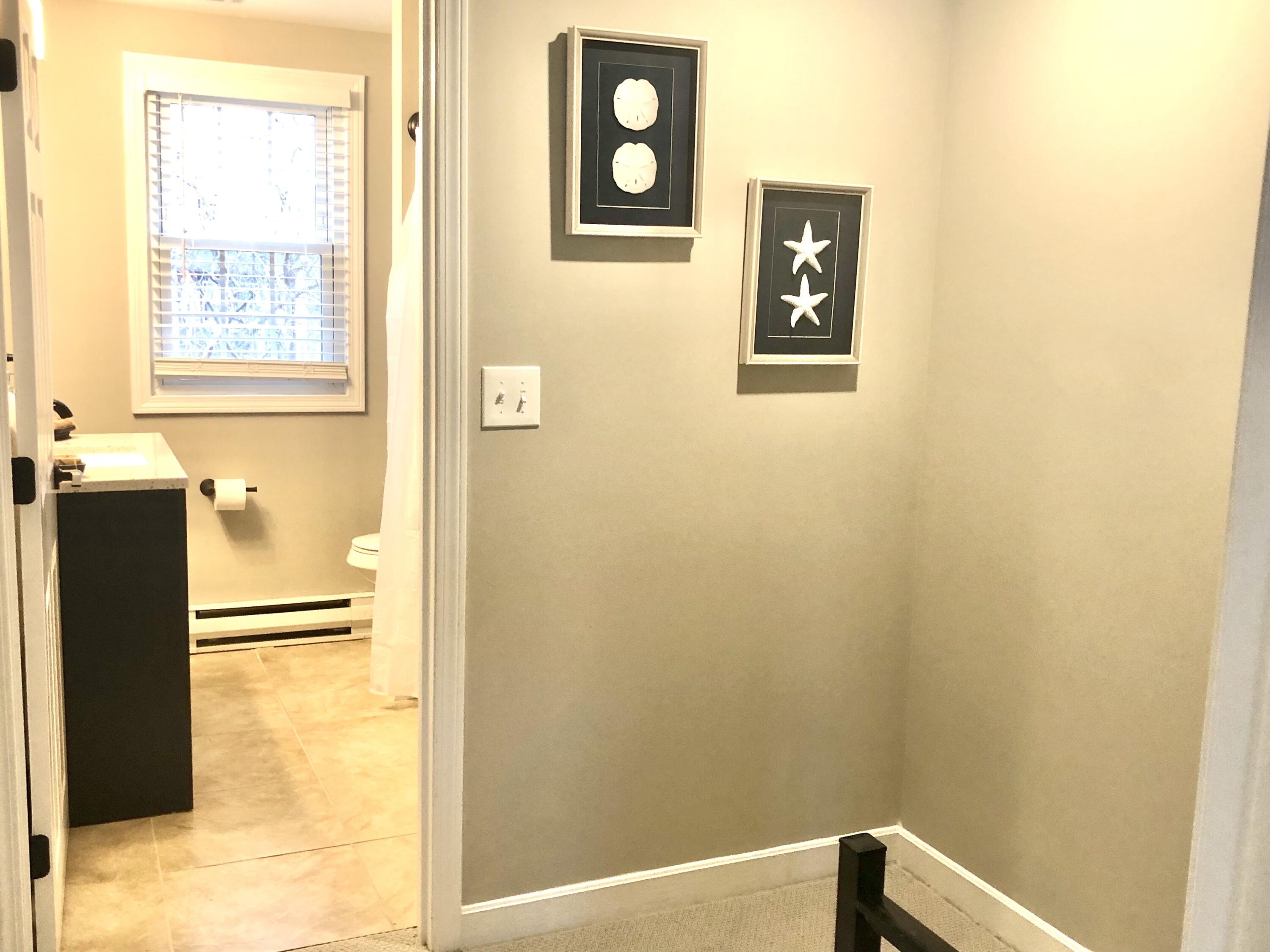 135 West Main Street, Unit 26 Hyannis, MA 02601 - Photo 18 of 29 a bathroom with a bathtub